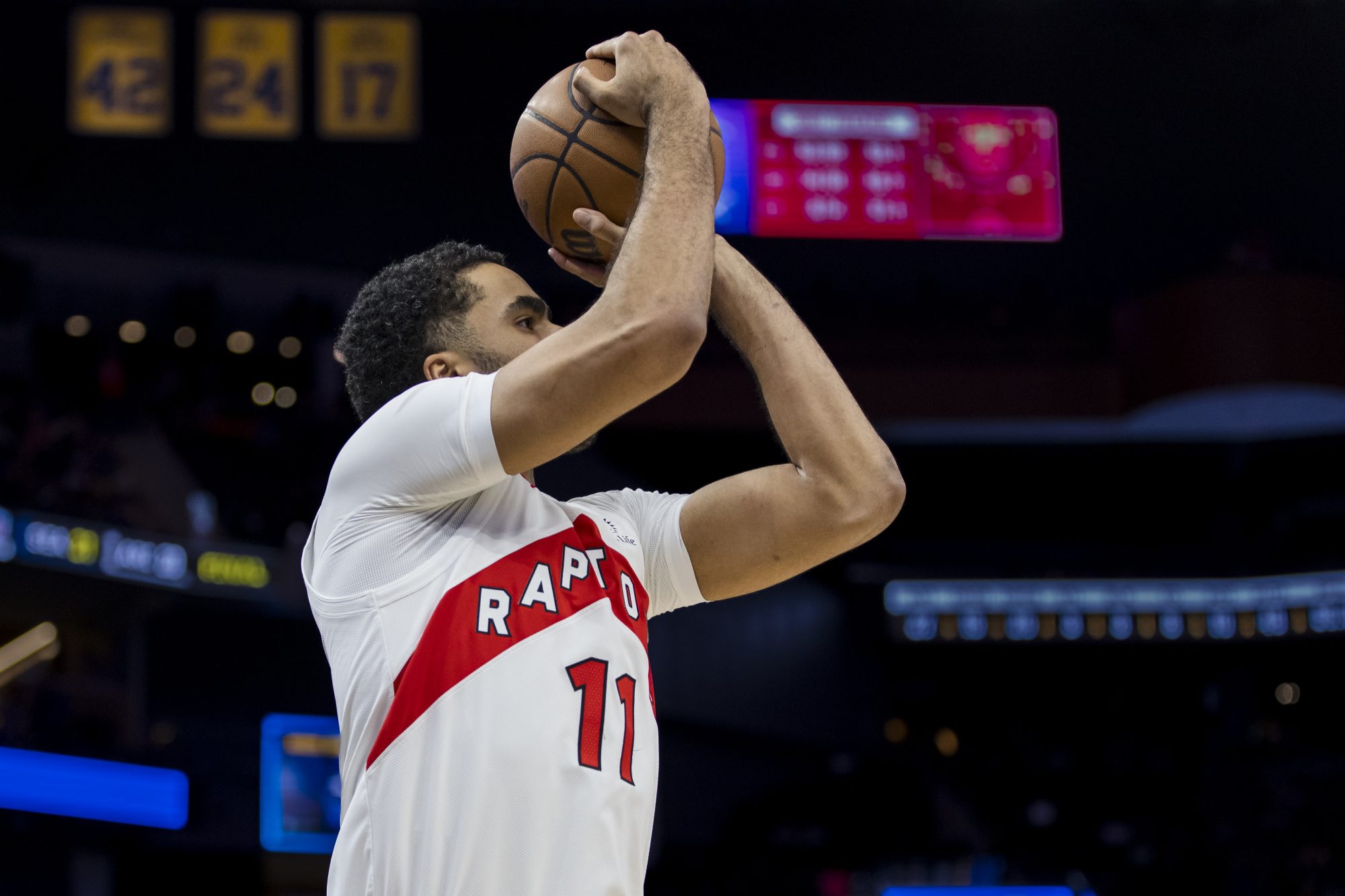 Jan 7, 2024; San Francisco, California, USA; Toronto Raptors forward Jontay Porter (11) takes a three-point shot against the Golden State Warriors during the second half at Chase Center.