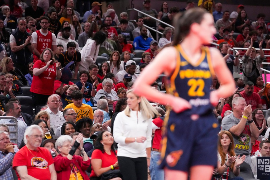 Indiana Fever fans cheer on their team, Thursday, May 16, 2024, during the Indiana Fever home opener game against the New York Liberty at Gainbridge Fieldhouse in Indianapolis.
