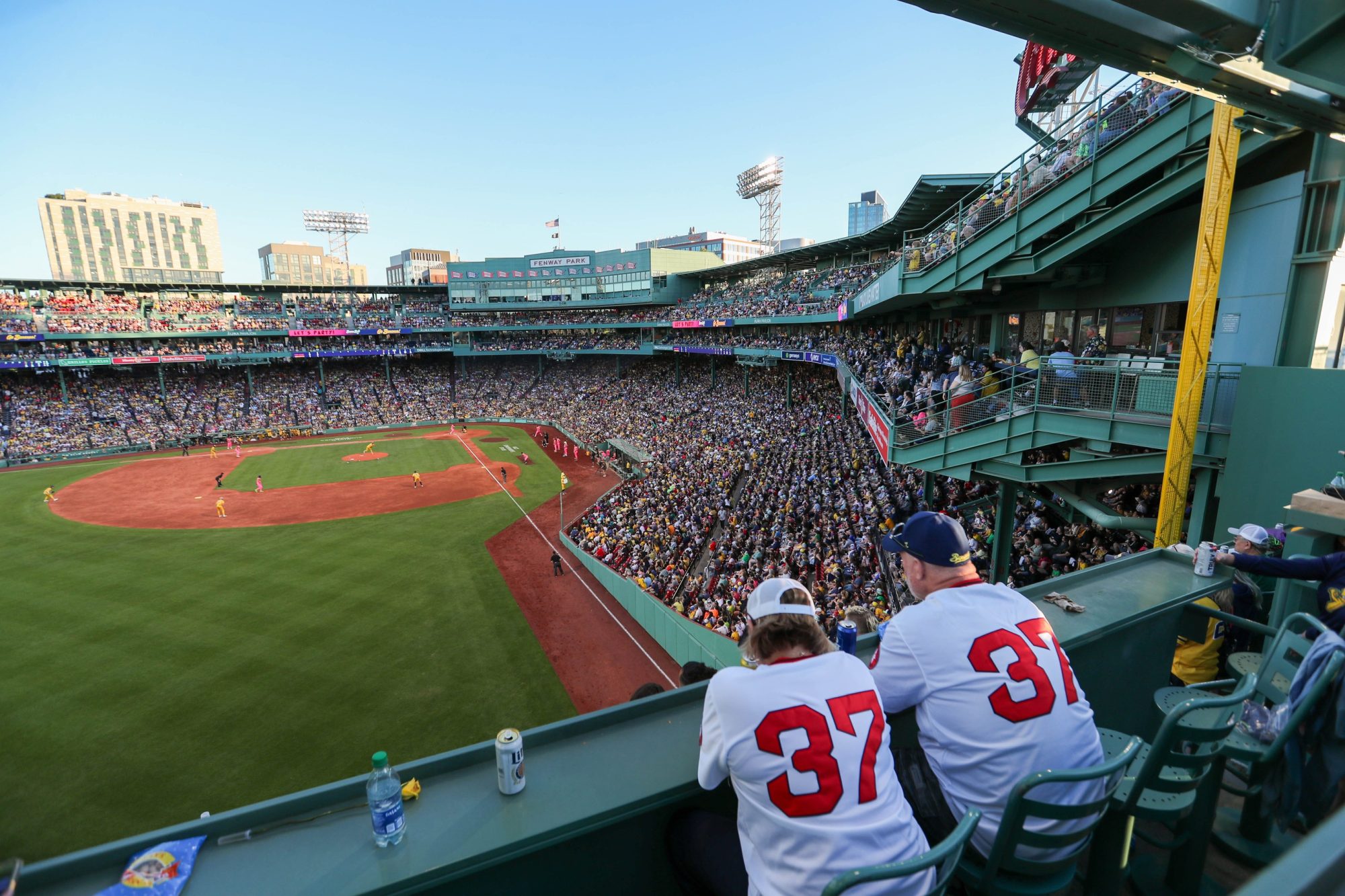 Saturday, June 8, 2024; Boston MA-Fans watch the game from the top of the Green Monster during the Savannah Bananas first Banana Ball game at Fenway Park on Saturday, June 8, 2024.