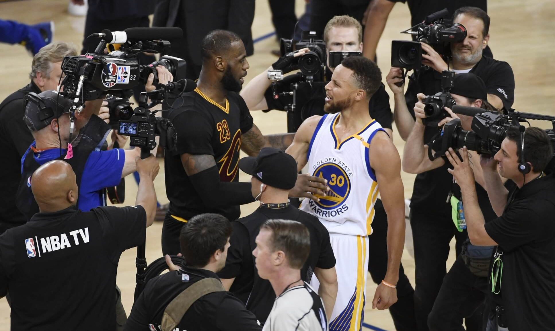 Jun 12, 2017; Oakland, CA, USA; Golden State Warriors guard Stephen Curry (30) greets Cleveland Cavaliers forward LeBron James (23) after game five of the 2017 NBA Finals at Oracle Arena. Mandatory Credit: Kyle Terada-USA TODAY Sports