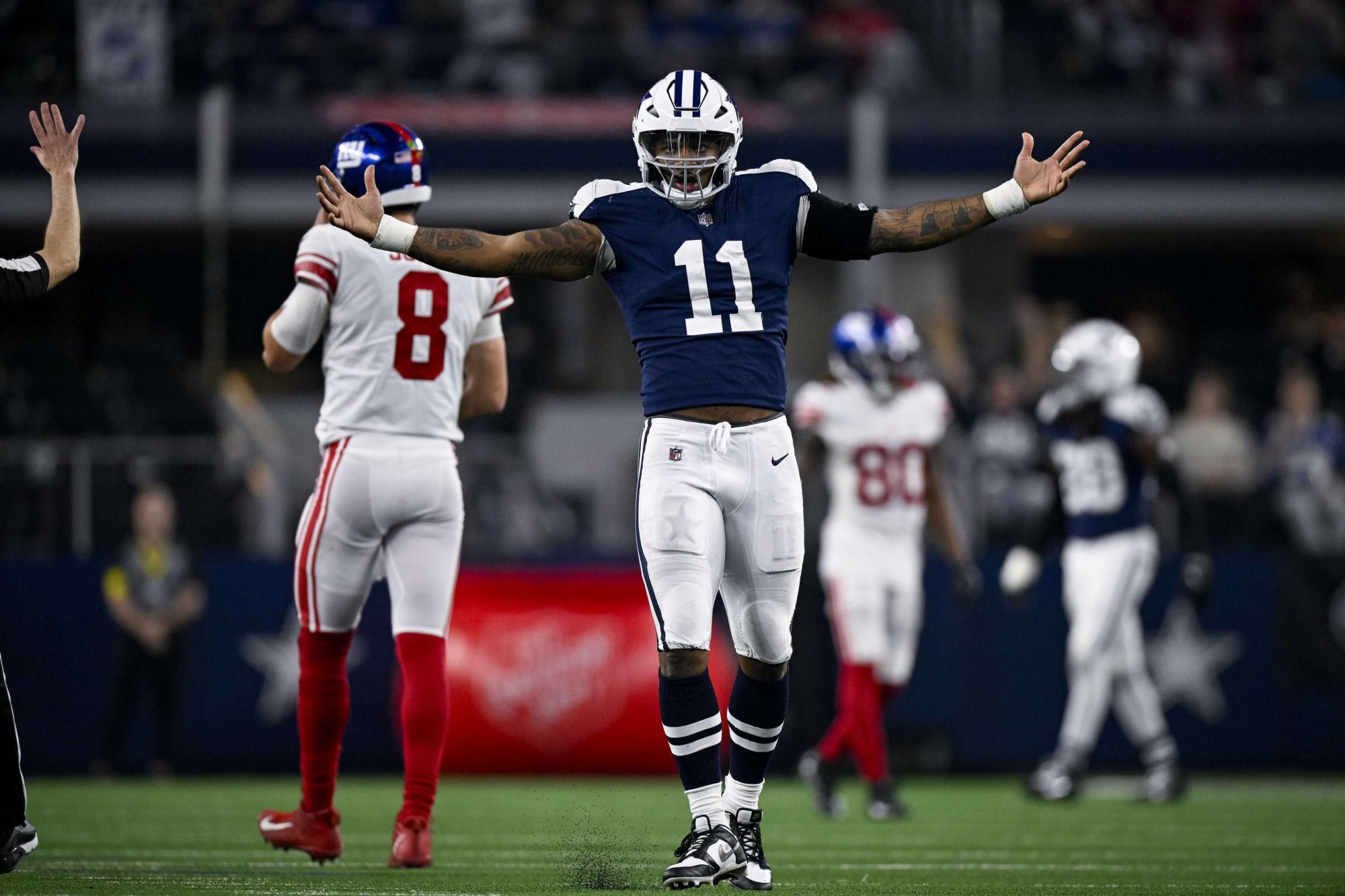 Nov 24, 2022; Arlington, Texas, USA; Dallas Cowboys linebacker Micah Parsons (11) celebrates after he sacks New York Giants quarterback Daniel Jones (8) during the game between the Dallas Cowboys and the New York Giants at AT&T Stadium. Mandatory Credit: Jerome Miron-USA TODAY Sports