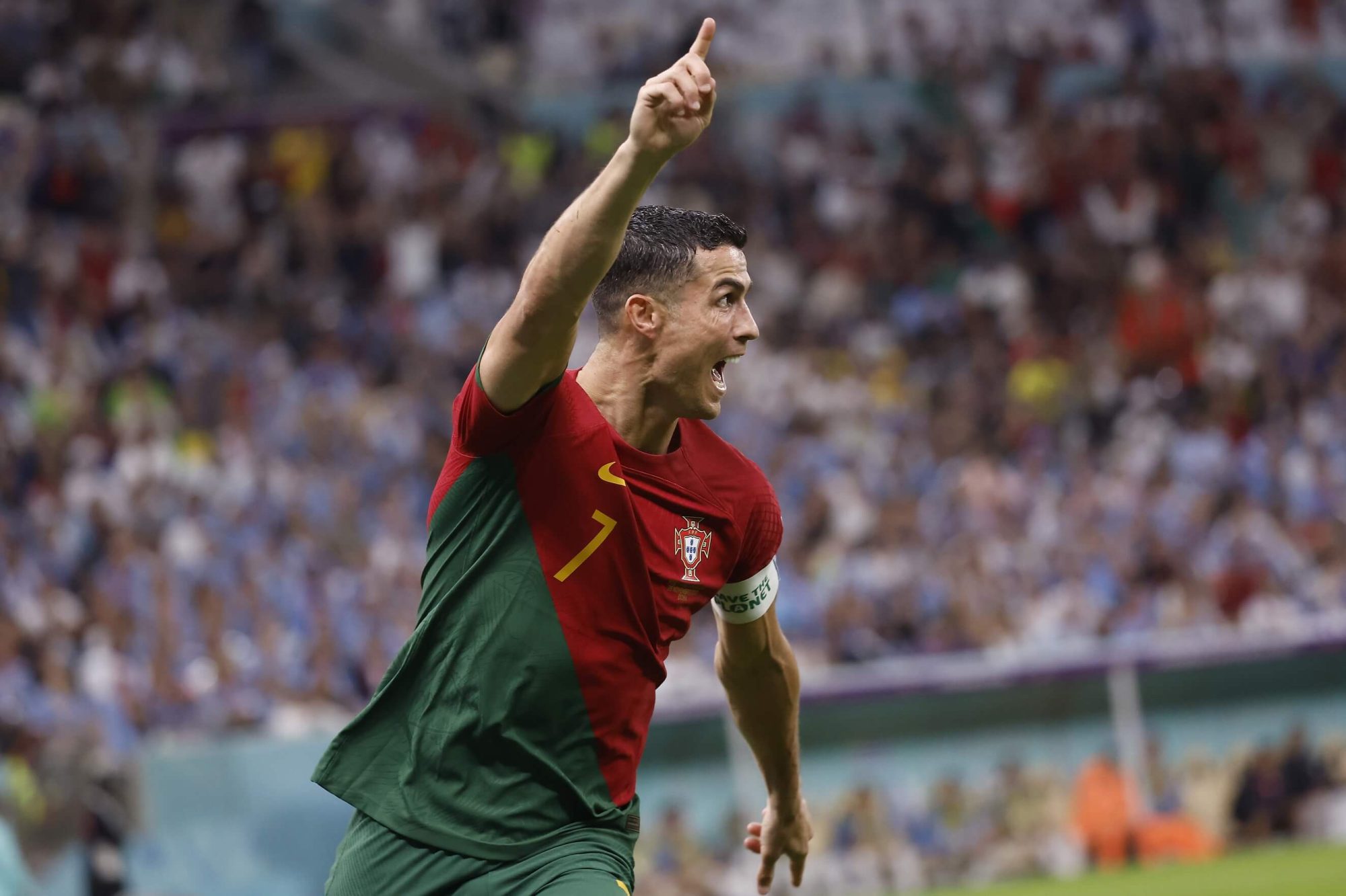 Nov 28, 2022; Lusail, Qatar; Portugal forward Cristiano Ronaldo (7) celebrates his goal scored against Uruguay during the second half of the group stage match in the 2022 World Cup at Lusail Stadium. The goal would instead be credited to midfielder Bruno Fernandes (8). Mandatory Credit: Yukihito Taguchi-USA TODAY Sports