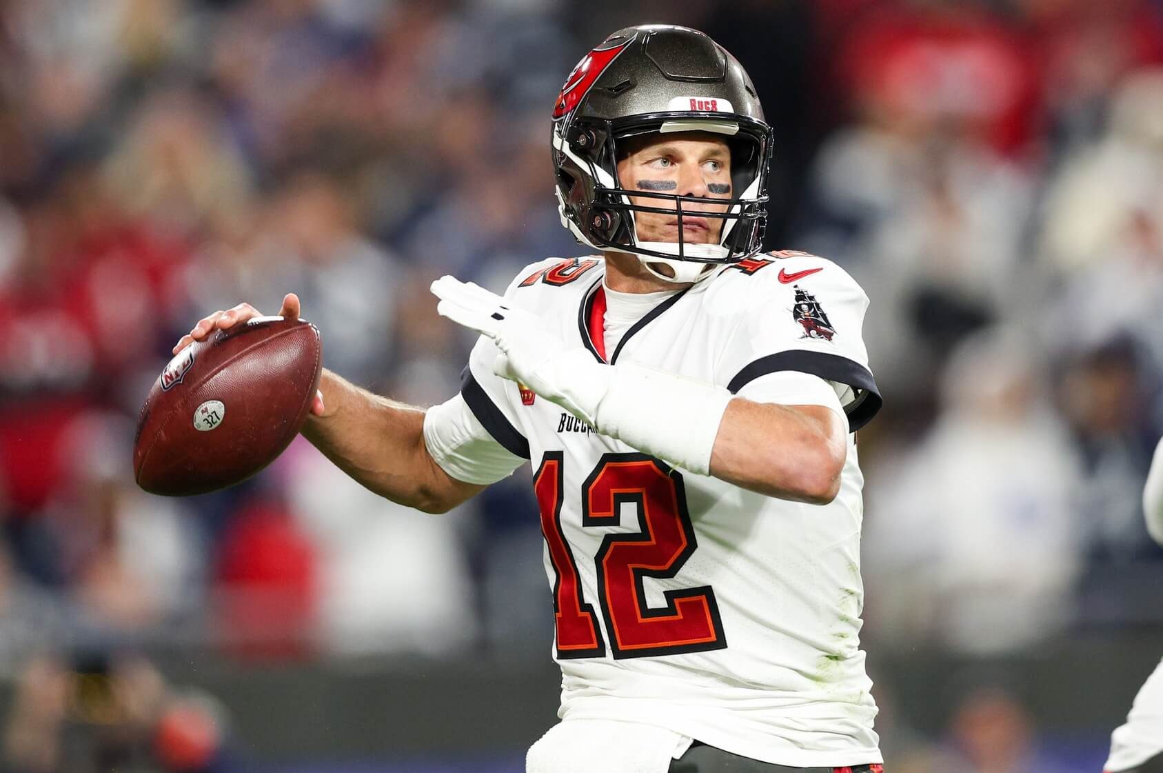 Jan 16, 2023; Tampa, Florida, USA; Tampa Bay Buccaneers quarterback Tom Brady (12) drops back to pass against the Dallas Cowboys in the third quarter during a wild card game at Raymond James Stadium. Mandatory Credit: Nathan Ray Seebeck-USA TODAY Sports