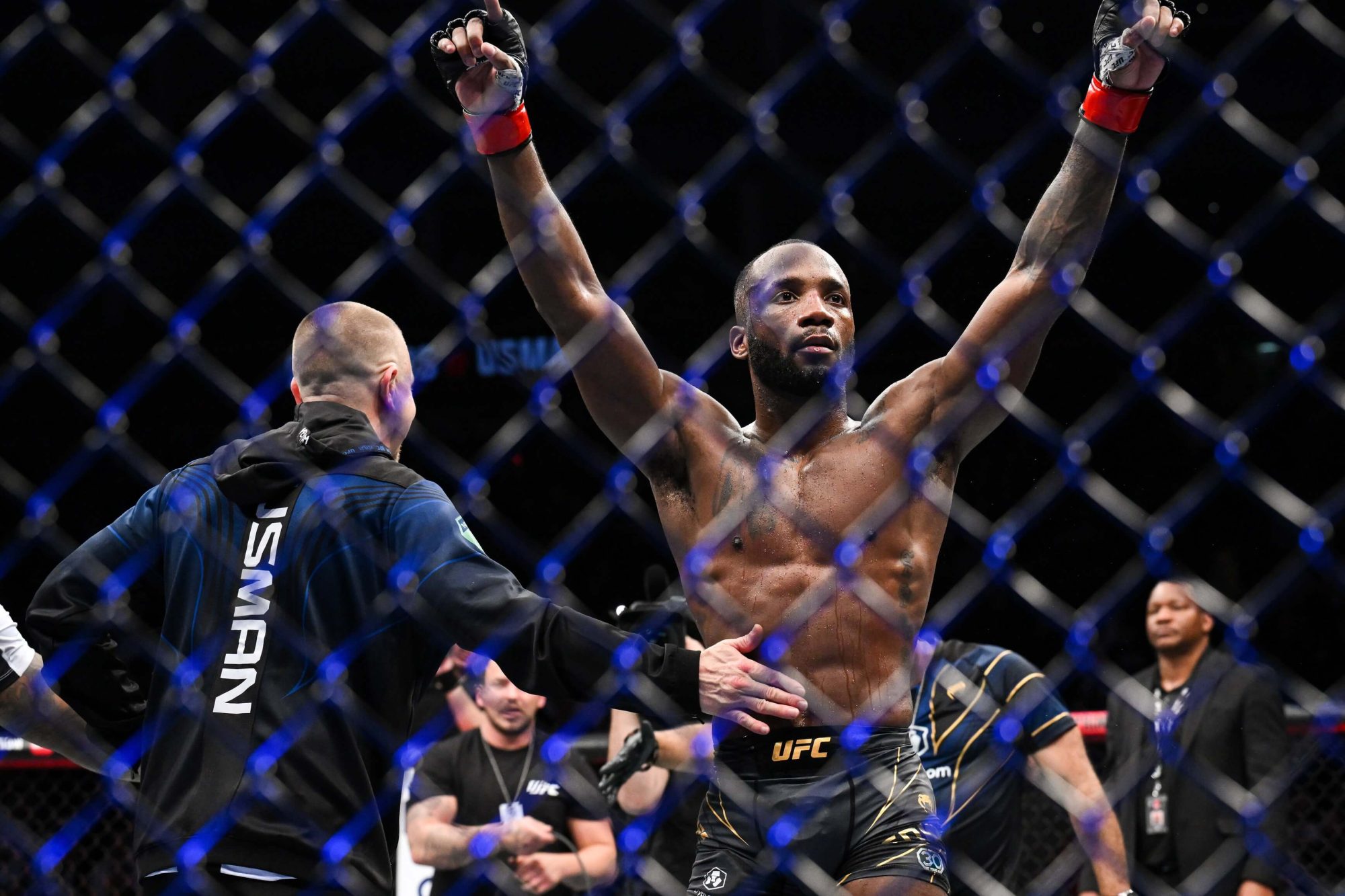 Mar 18, 2023; London, UNITED KINGDOM; Leon Edwards (red gloves) celebrates after defeating Kamaru Usman (not pictured) during UFC 286 at O2 Arena. Mandatory Credit: Per Haljestam-USA TODAY Sports