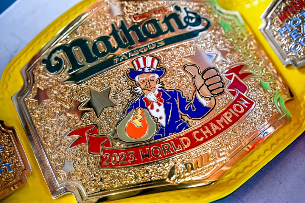 Nathan's Hot Dog Eating champion Joey Chestnut's belt before the Lugnuts game against the TinCaps on Thursday, Aug. 10, 2023, at Jackson Field in Lansing. Chestnut was participating in an olive burger eating contest before the game.