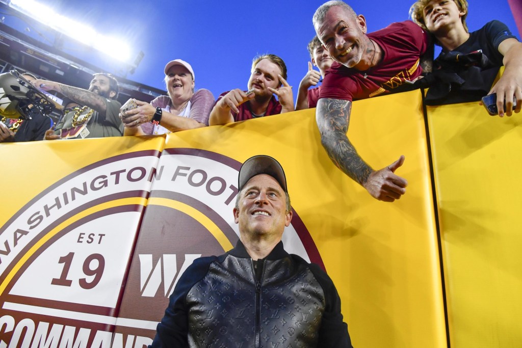 Oct 5, 2023; Landover, Maryland, USA; Washington Commanders owner Josh Harris with fans before the game against the Chicago Bears at FedExField.