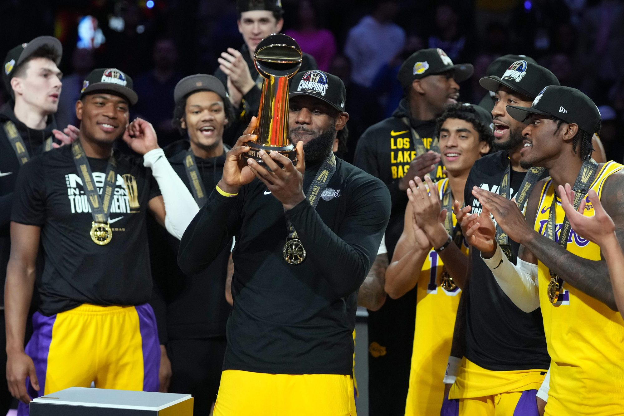 Dec 9, 2023; Las Vegas, Nevada, USA; Los Angeles Lakers forward LeBron James (23) celebrates with the MVP Trophy after defeating the Indiana Pacers in the in season tournament championship final at T-Mobile Arena.