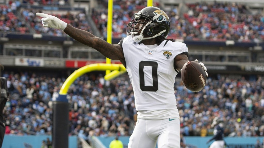 Jan 7, 2024; Nashville, Tennessee, USA; Jacksonville Jaguars wide receiver Calvin Ridley (0) reacts after scoring a touchdown against the Tennessee Titans during the first half at Nissan Stadium.