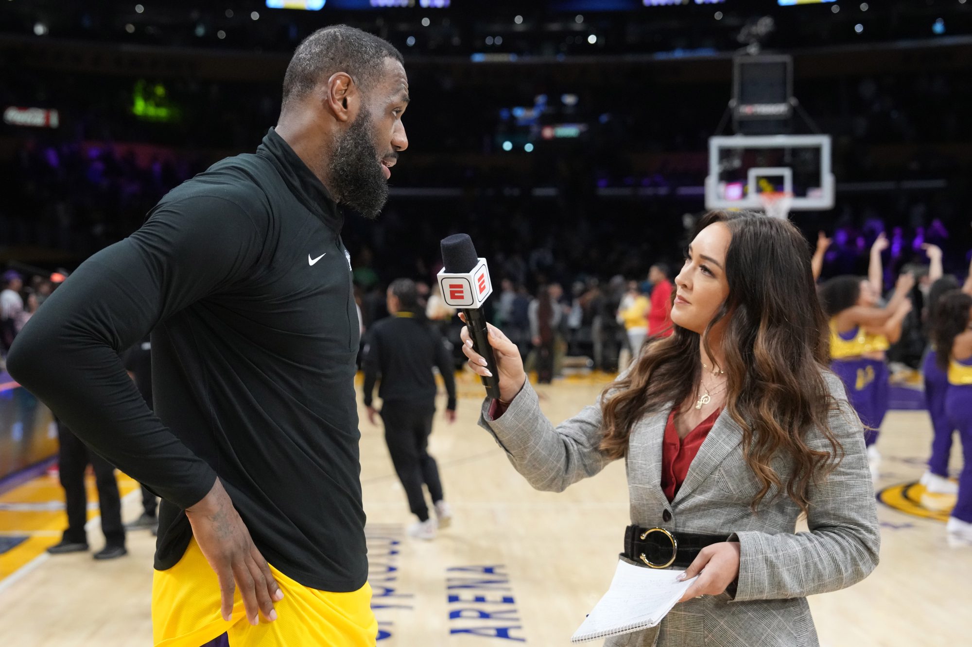 Jan 17, 2024; Los Angeles, California, USA; ESPN reporter Cassidy Hubbarth (right) interviews Los Angeles Lakers forward LeBron James after the game against the Dallas Mavericks at Crypto.com Arena.