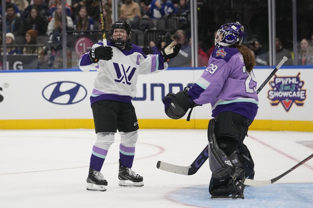 Feb 1, 2024; Toronto, Ontario, CANADA; Team King forward Kendall Coyne Schofield (26) celebrates her goal against Team Kloss goaltender Nicole Hensley (29) during the PWHL 3-on-3 Showcase during NHL All-Star Thursday at Scotiabank Arena.