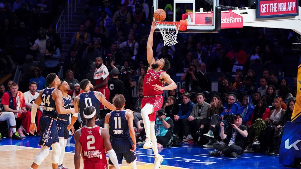 Feb 18, 2024; Indianapolis, Indiana, USA; Western Conference center Karl-Anthony Towns (32) of the Minnesota Timberwolves shoots the ball during the first half of the 73rd NBA All Star game at Gainbridge Fieldhouse.