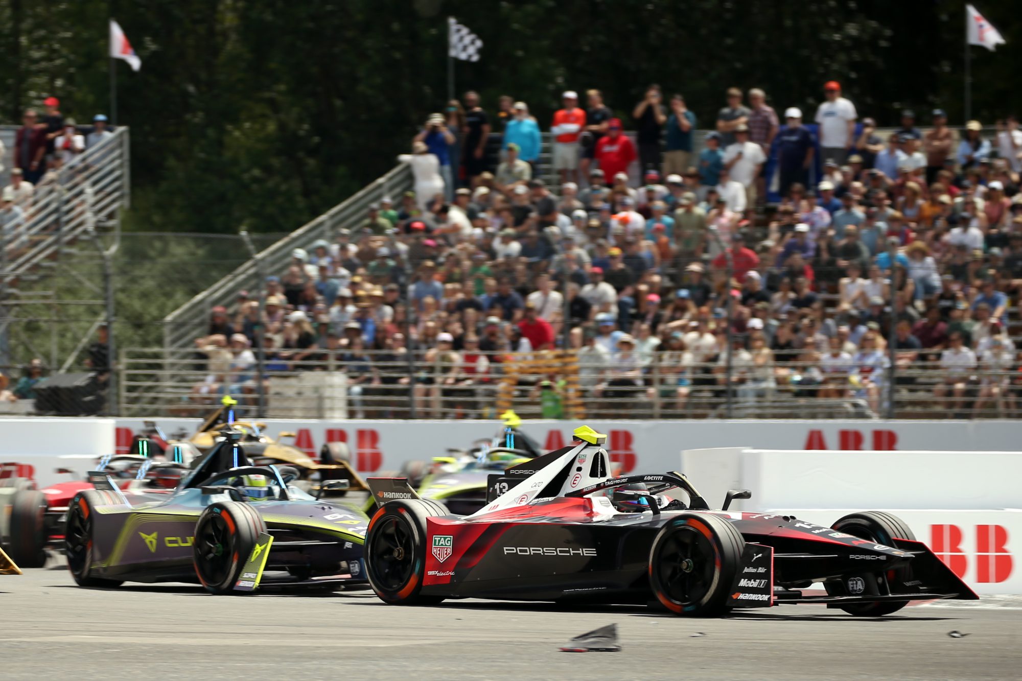 Jun 30, 2024; Portland, Oregon, USA; António Félix da Costa (13) of TAG Heuer Porsche Formula E Team leads the pack in the 2024 Hankook Portland E-Prix at Portland International Raceway.