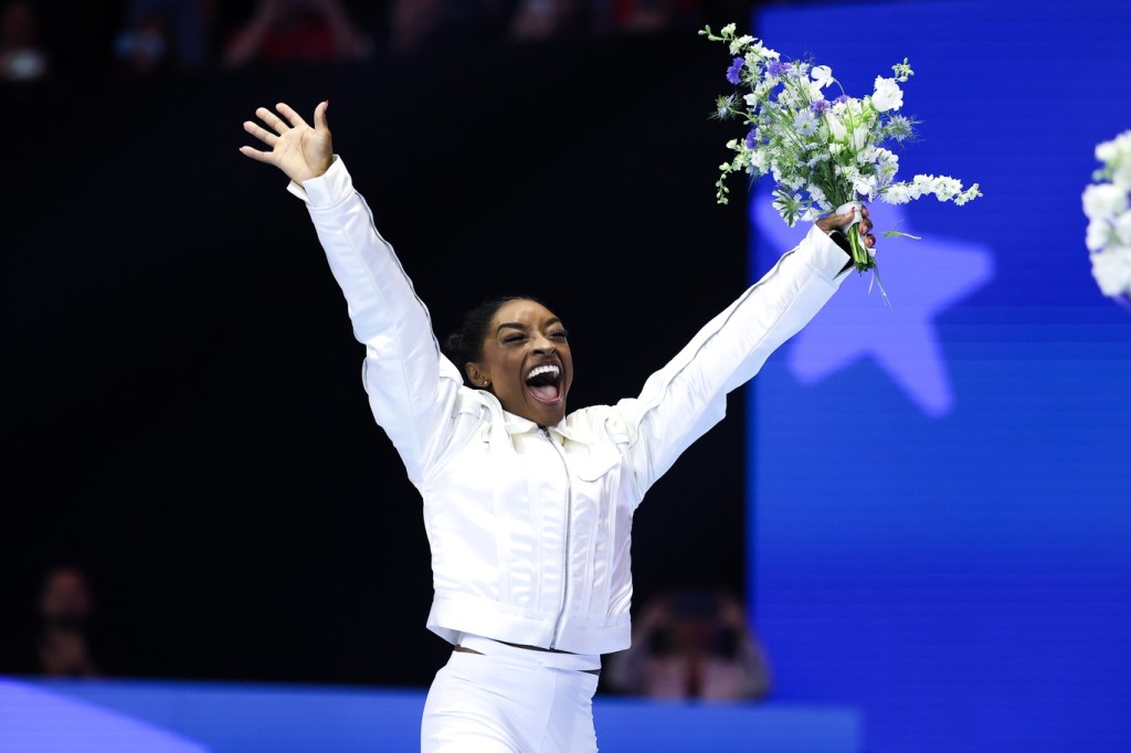 Jun 30, 2024; Minneapolis, Minnesota, USA; Simone Biles reacts after being selected for the 2024 U.S. Olympic Women's gymnastics team during the U.S. Olympic Team Gymnastics Trials at Target Center.