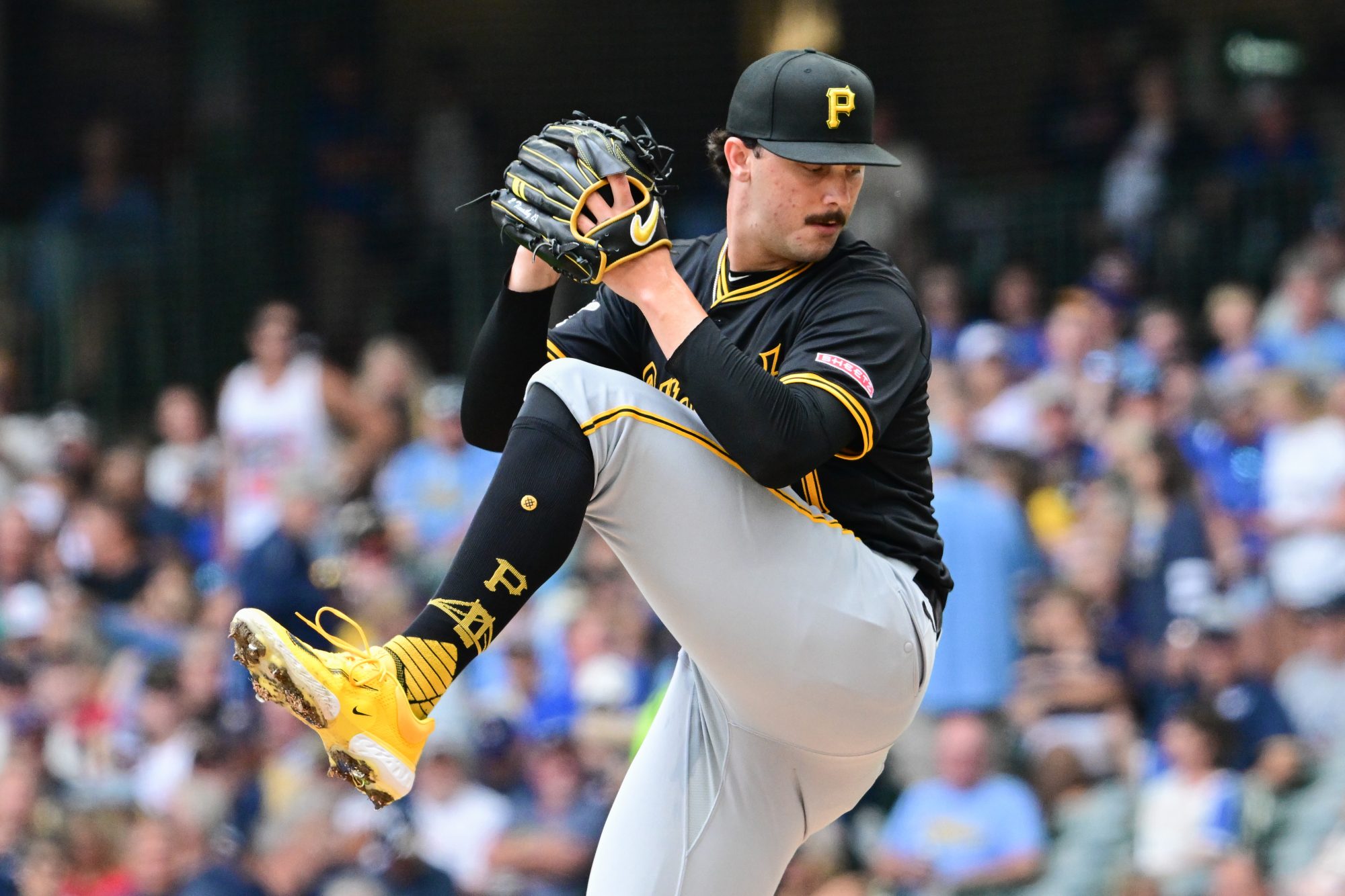 Jul 11, 2024; Milwaukee, Wisconsin, USA; Pittsburgh Pirates starting pitcher Paul Skenes (30) pitches in the first inning against the Milwaukee Brewers at American Family Field.