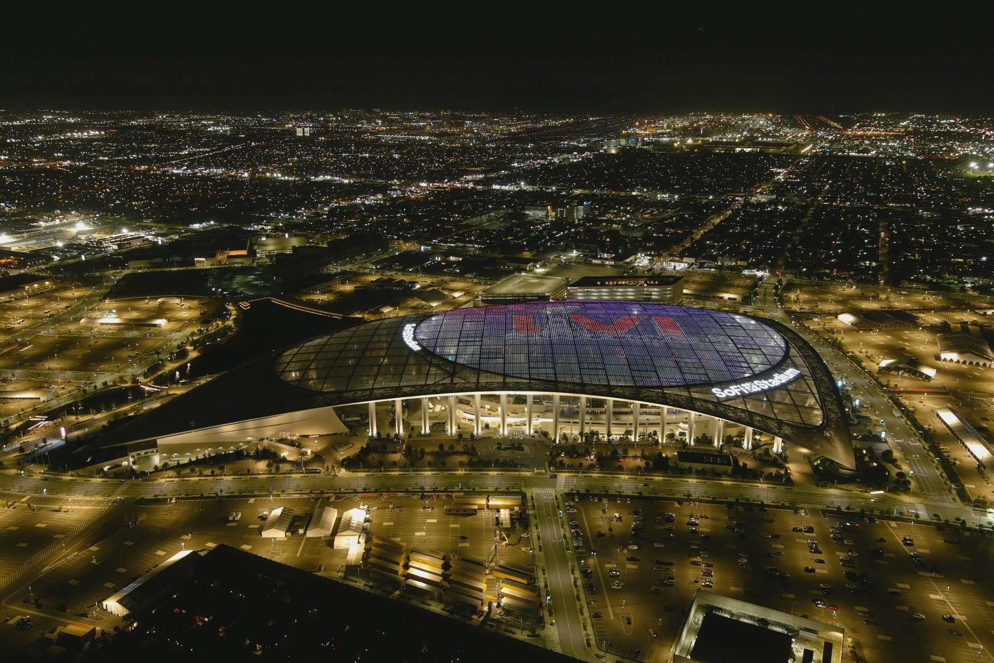 Jan 26, 2022; Inglewood, CA, USA; A general overall aerial view of SoFi Staidum with Super Bowl LVI logo projected on the roof. Super Bowl LVI will be played at SoFi Stadium on Feb. 13, 2022. Mandatory Credit: Kirby Lee-USA TODAY Sports