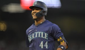 Jul 13, 2024; Anaheim, California, USA; Julio Rodriguez #44 of the Seattle Mariners smiles after a single in the fifth inning against the Los Angeles Angels at Angel Stadium. Mandatory Credit: Jayne Kamin-Oncea-USA TODAY Sports