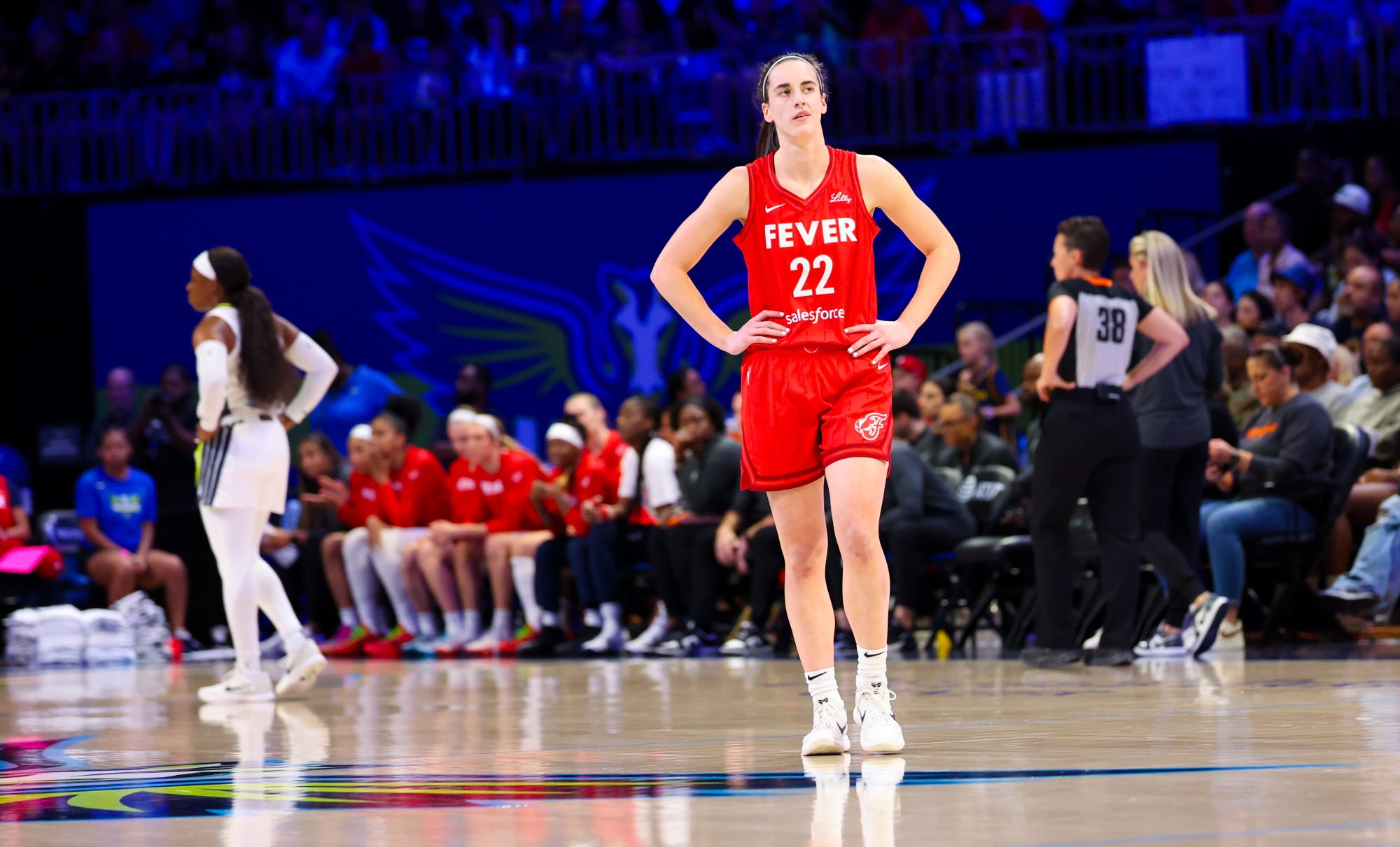 Jul 17, 2024; Arlington, Texas, USA; Indiana Fever guard Caitlin Clark (22) reacts during the first half against the Dallas Wings at College Park Center.