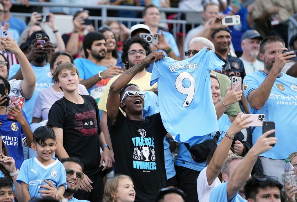 Aug 3, 2024; Columbus, OH, USA; Manchester City fans cheer as Erling Haaland (9) walks off the field after scoring three goals to to beat Chelsea 4-2 during the FC Series game at Ohio Stadium.