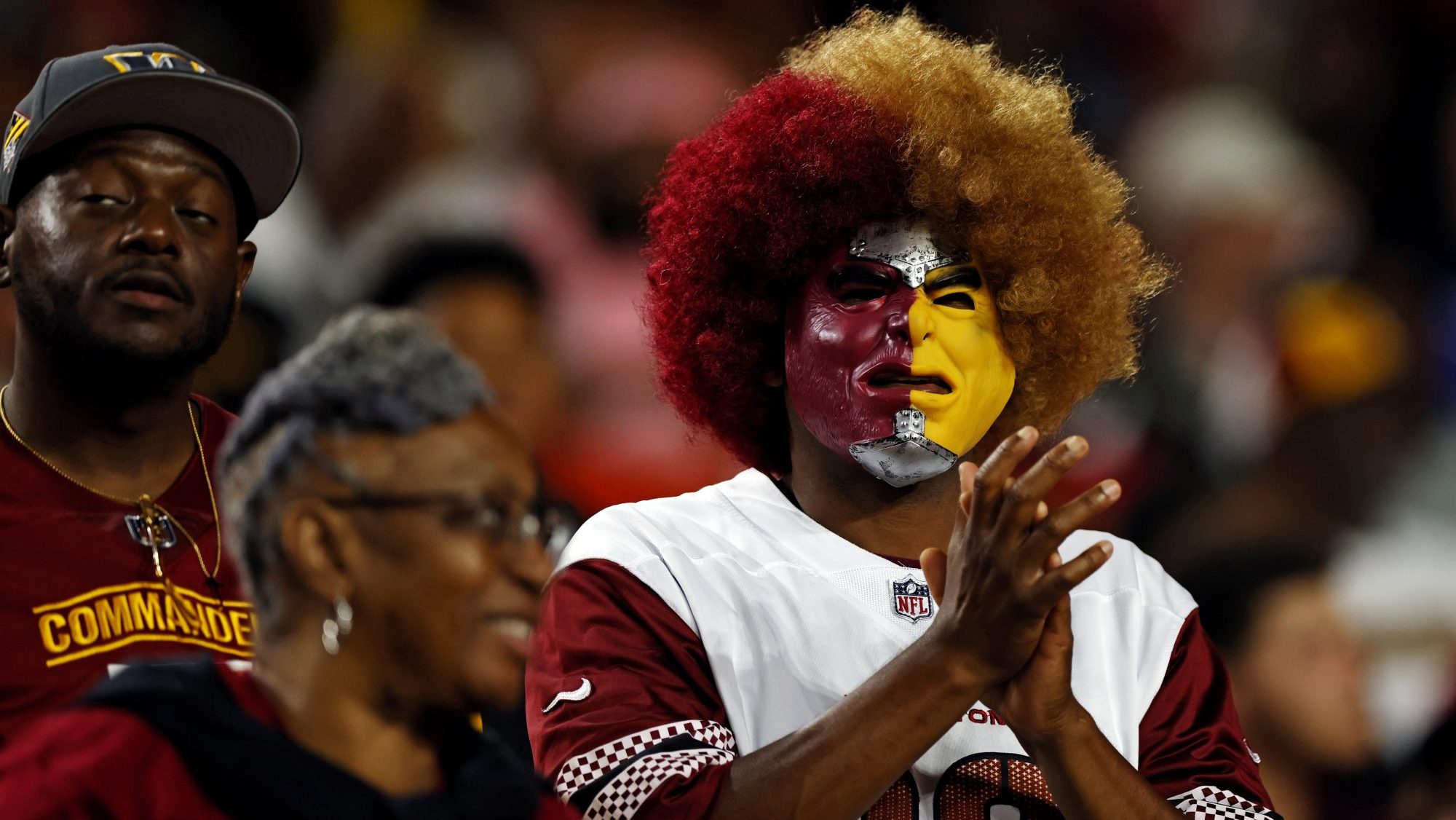 Aug 25, 2024; Landover, Maryland, USA; Fans cheer during the second quarter during a preseason game between the Washington Commanders and the New England Patriots at Commanders Field.