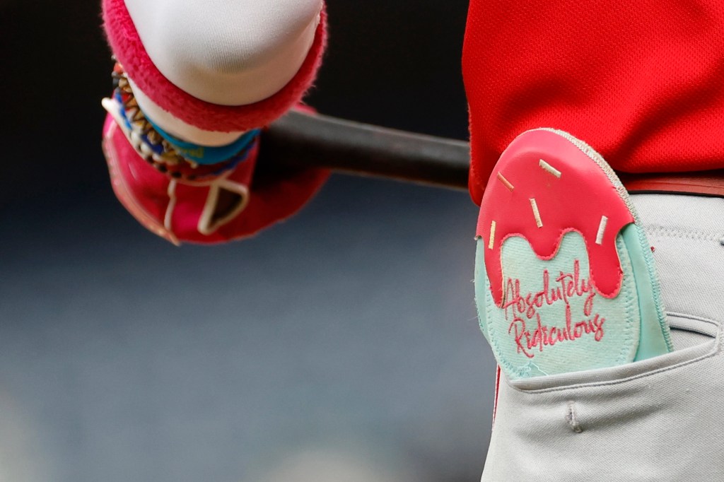 Jul 6, 2023; Washington, District of Columbia, USA; A view of the sliding mitt of Cincinnati Reds shortstop Elly De La Cruz (44) in his back pocket prior to an at-bat against the Washington Nationals during the second inning at Nationals Park.