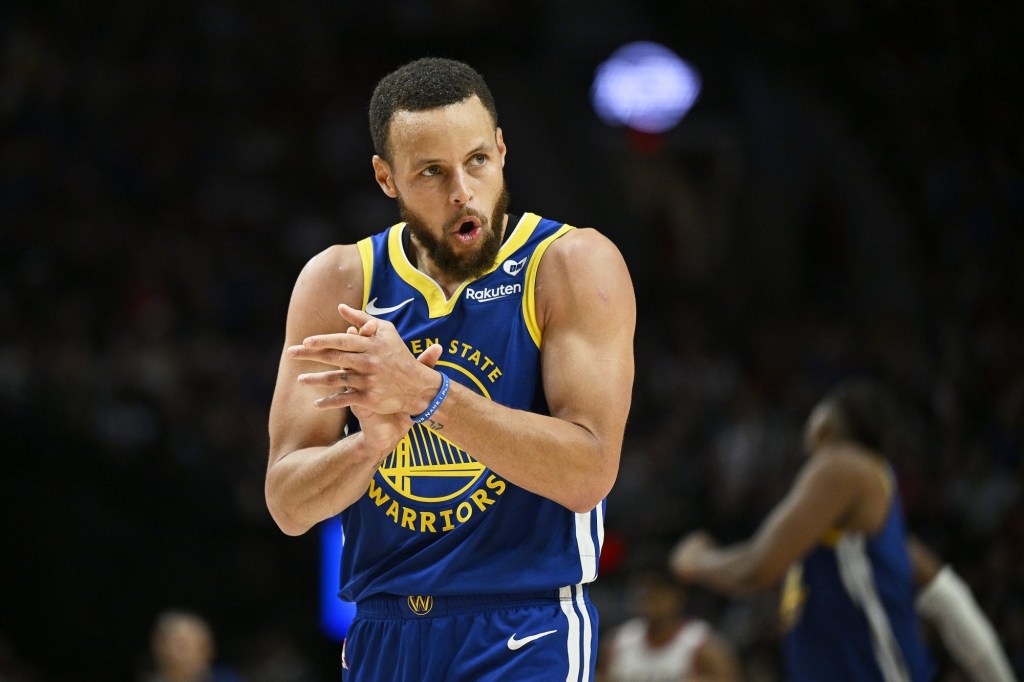 Apr 11, 2024; Portland, Oregon, USA; Golden State Warriors guard Stephen Curry (30) claps his hands in celebration during the second half against the Portland Trail Blazers at Moda Center.