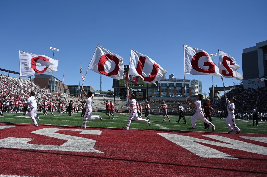 Aug 31, 2024; Pullman, Washington, USA; Washington State Cougars cheerleader celebrate after a touchdown against the Portland State Vikings in the first half at Gesa Field at Martin Stadium.