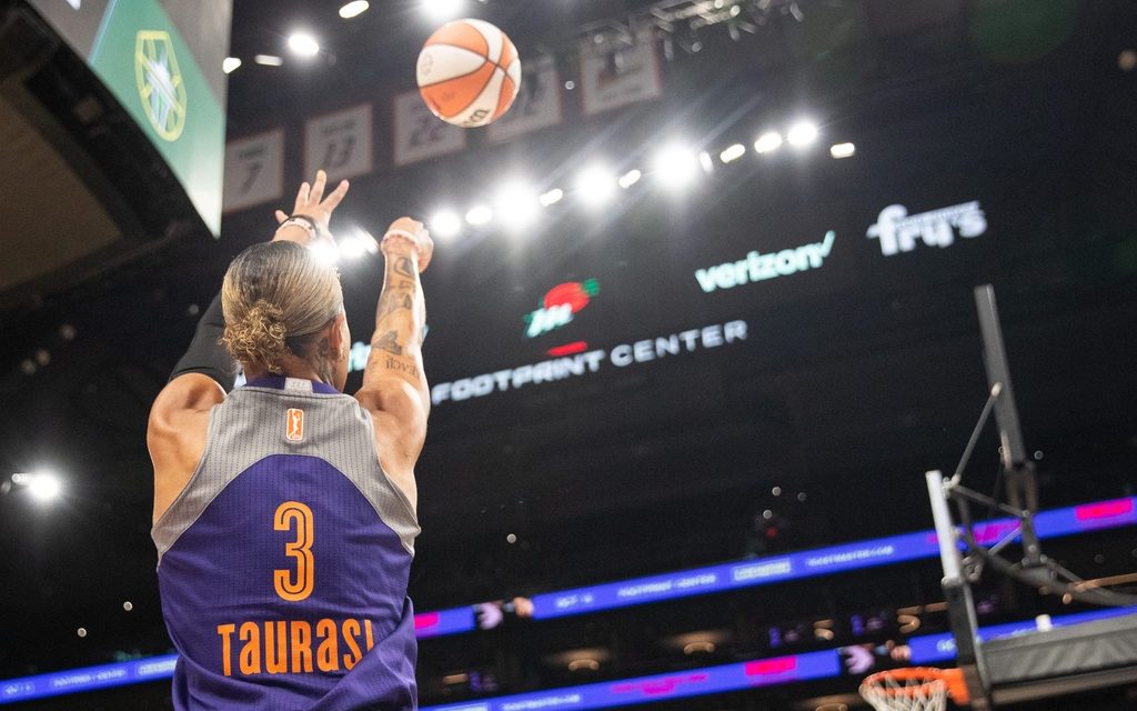 Phoenix Mercury guard Natasha Cloud (0) warms up in a Phoenix Mercury guard Diana Taurasi (3) jersey on Sept. 19, 2024 at Footprint Center in Phoenix.