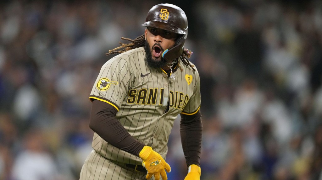 Sep 25, 2024; Los Angeles, California, USA; San Diego Padres right fielder Fernando Tatis Jr. (23) celebrates after hitting a solo home run in the fifth inning against the Los Angeles Dodgers at Dodger Stadium.