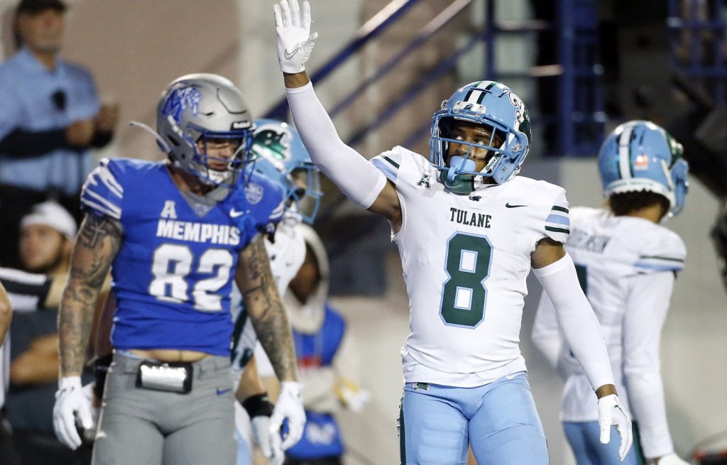 Football players from Memphis (left) and Tulane