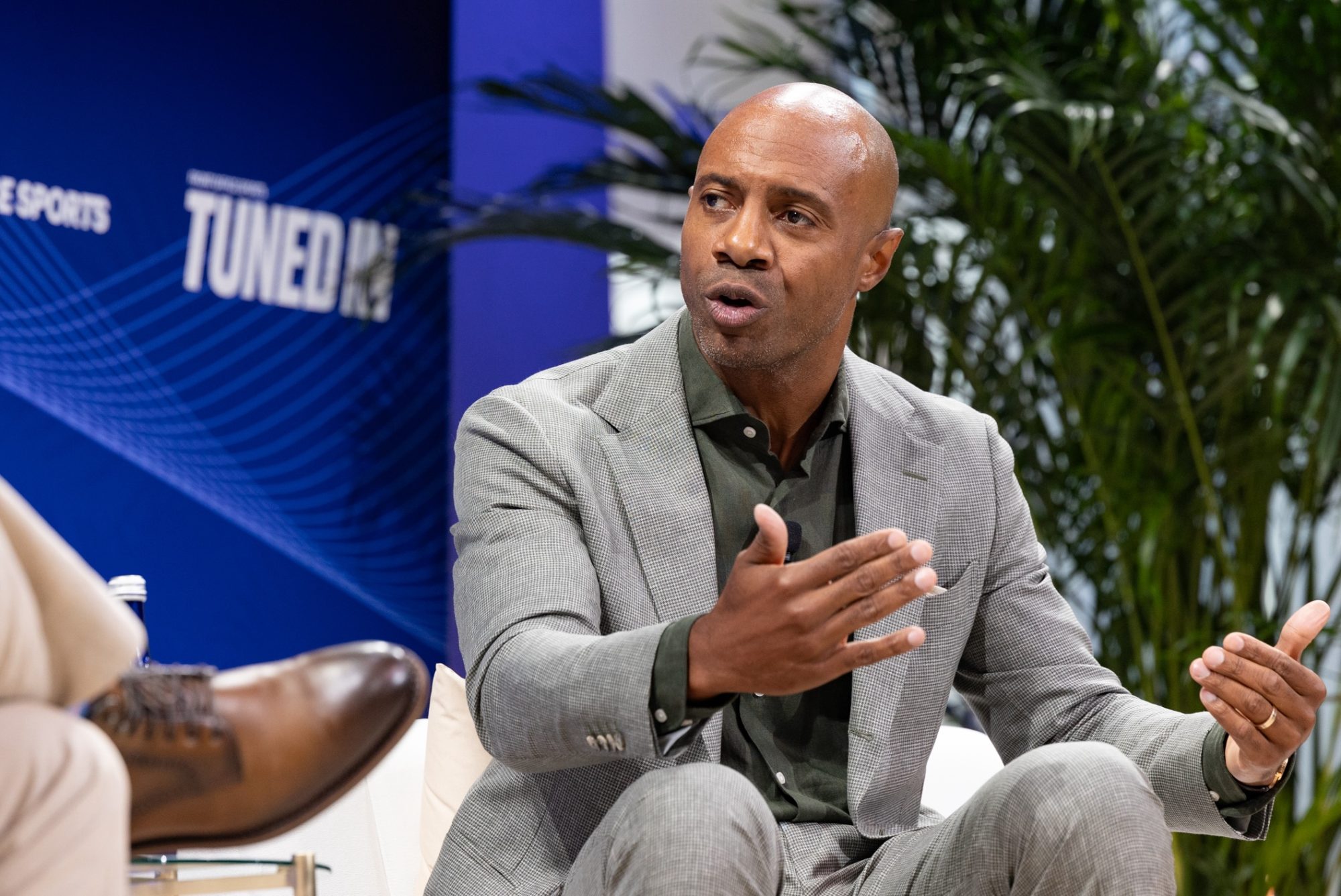 ESPN commentator Jay Williams speaking at a conference.