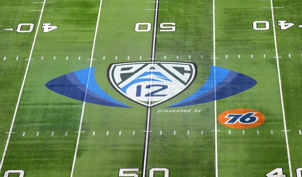 A Pac-12 logo on the field