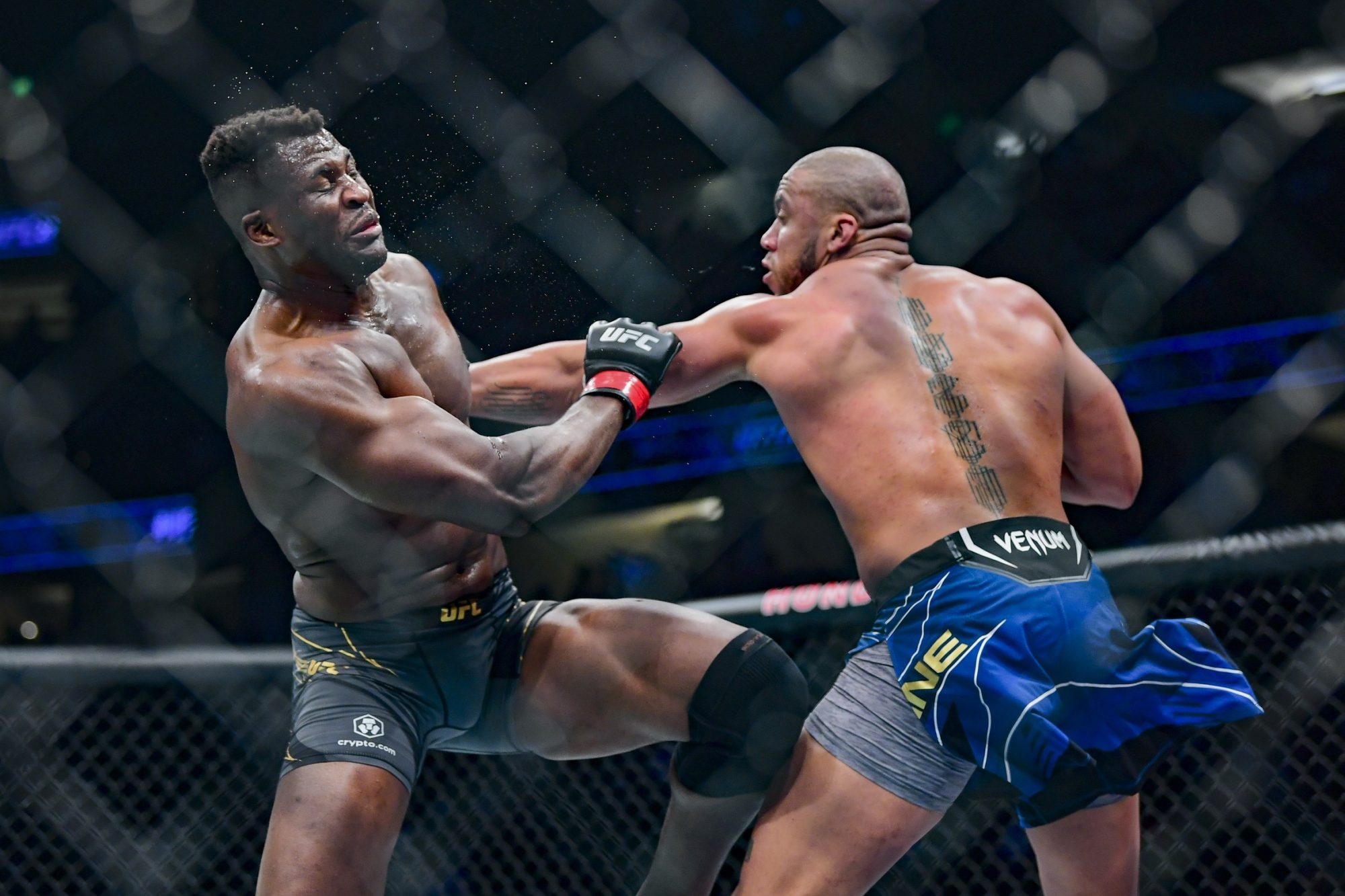 Jan 22, 2022; Anaheim, California, USA; Francis Ngannou (red gloves) competes against Ciryl Gane (blue gloves) during UFC 270 at Honda Center.