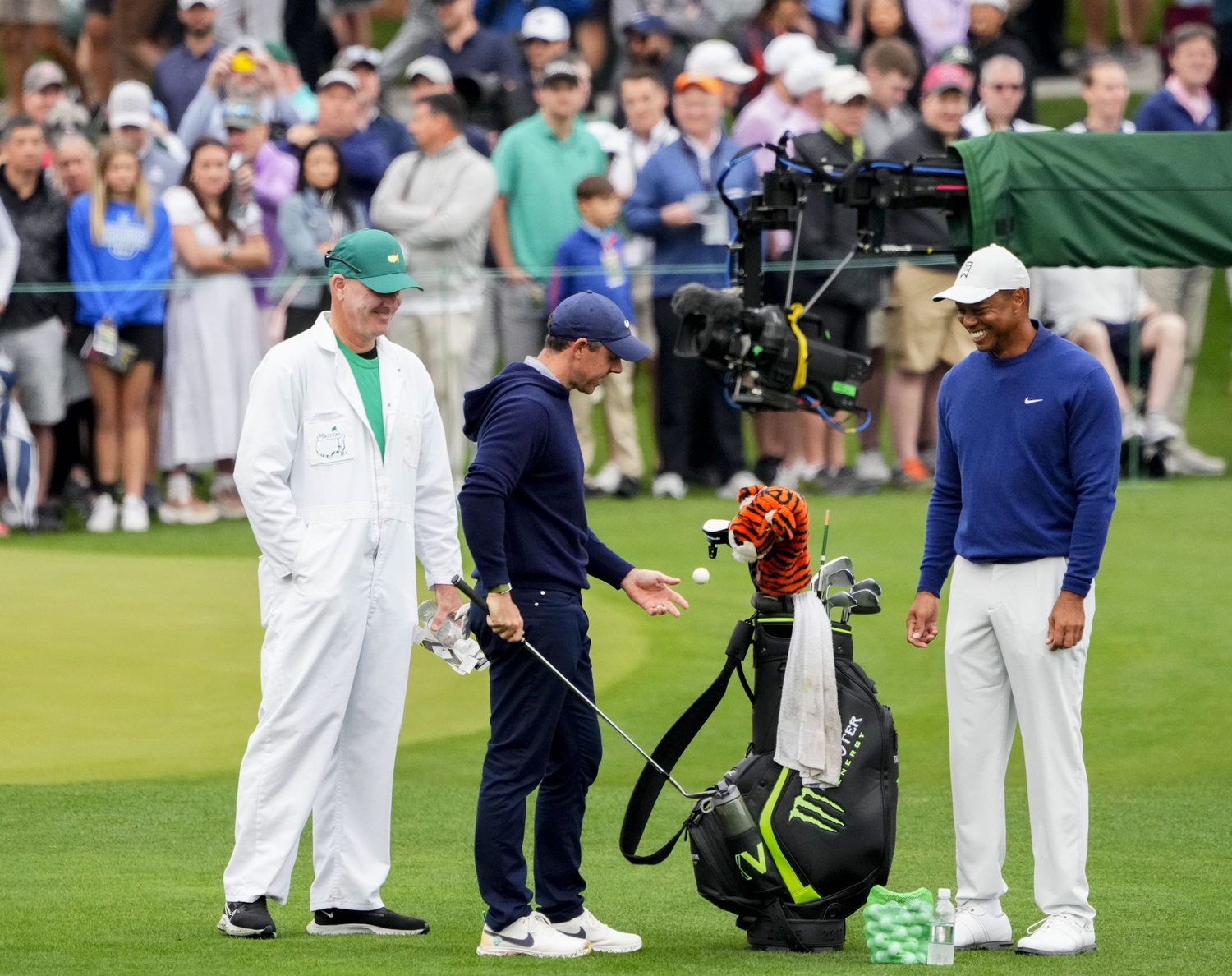 Apr 3, 2023; Augusta, Georgia, USA; Rory McIlroy bouces Tiger Woods' golf ball off his wedge during a practice round for The Masters golf tournament at Augusta National Golf Club.