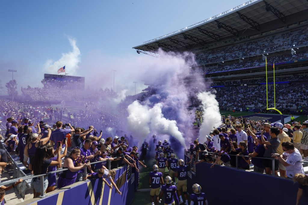 Sep 9, 2023; Seattle, Washington, USA; Washington Huskies players exit the tunnel before a game against the Tulsa Golden Hurricane at Alaska Airlines Field at Husky Stadium.