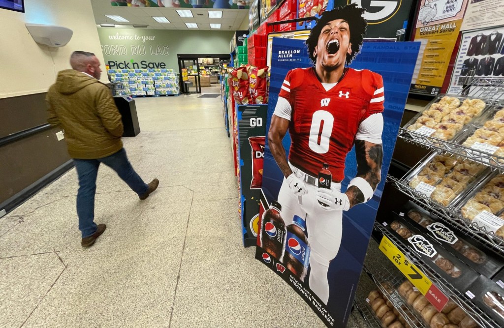 A promotional display for Pepsi featuring Wisconsin running back Braelon Allen is shown in November 2022 at a Pick 'n Save store in Fond du Lac, Wis. When the NCAA enacted Name Image Likeness (NIL) legislation in July 2021 it gave athletes the opportunity to earn money off endorsements as well as use their name in support of causes important to them.