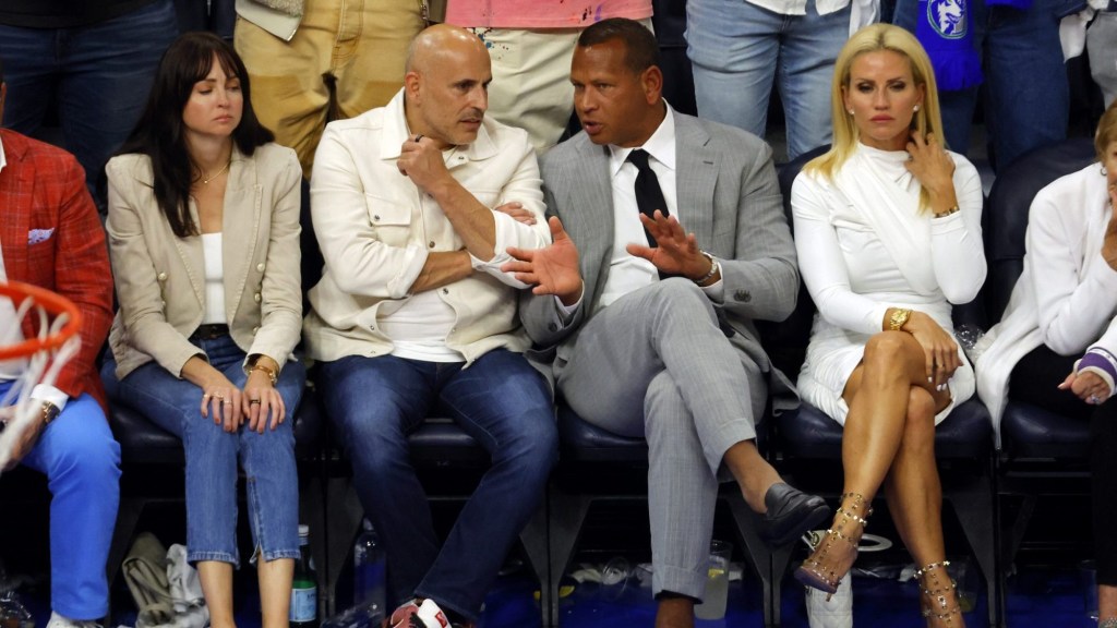 May 22, 2024; Minneapolis, Minnesota, USA; Minnesota Timberwolves minority owners Marc Lore and Alex Rodriguez look on in the second half against the Dallas Mavericks during game one of the western conference finals for the 2024 NBA playoffs at Target Center.