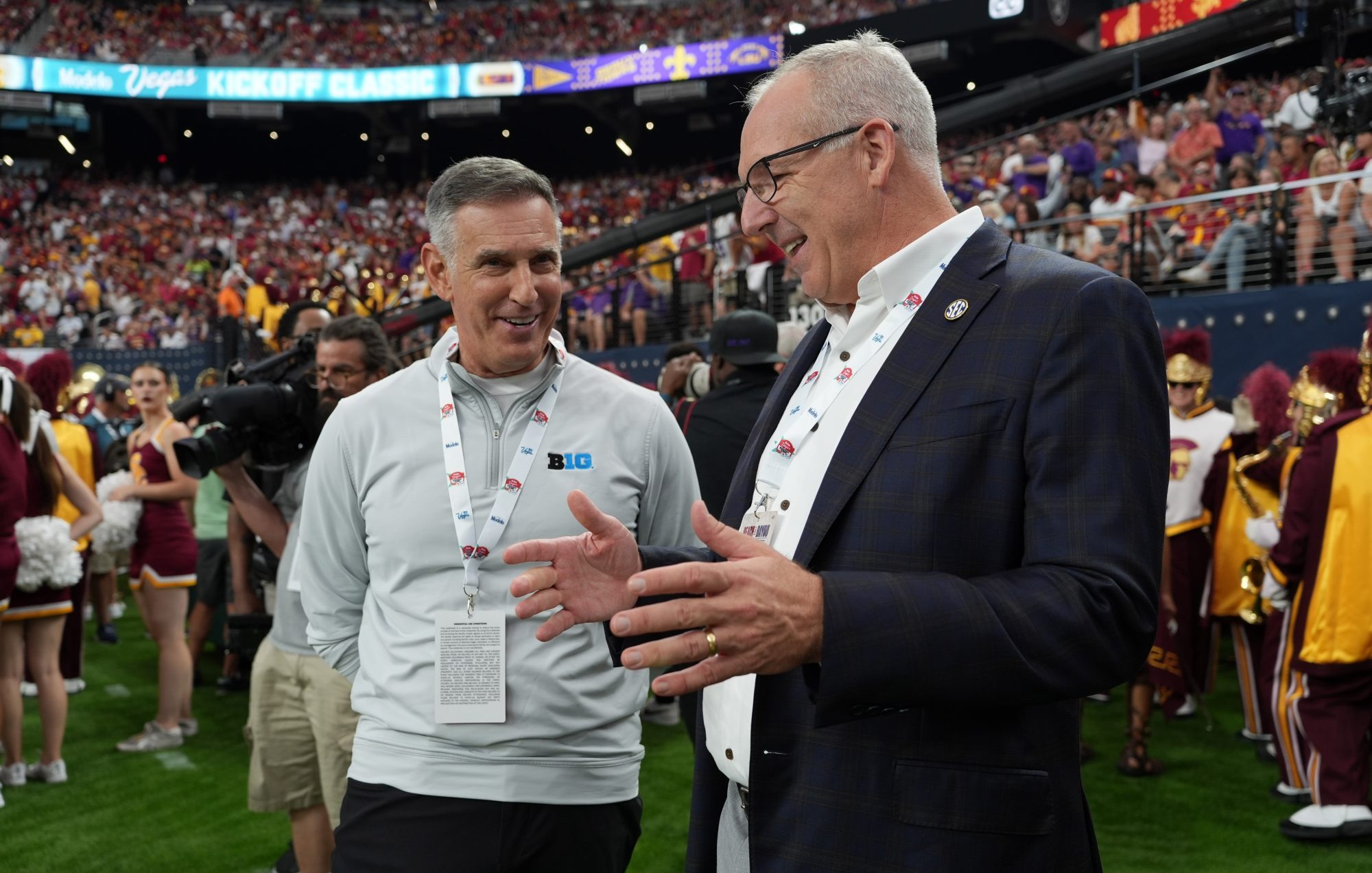 Sep 1, 2024; Paradise, Nevada, USA; Big 10 commissioner Tony Petitti (left) and SEC commissioner Greg Sankey attend the game between the LSU Tigers and the Southern California Trojans at Allegiant Stadium.