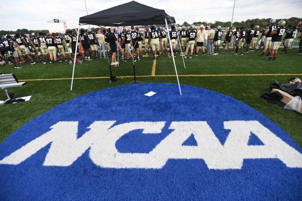 The NCAA logo on the field in the closing second of the Anderson University inaugural football game with St. Andrew's University on Spero Financial Field at Melvin and Dollie Younts Stadium at Anderson University in Anderson, S.C. Saturday, September 7, 2024. Anderson won 51-14.