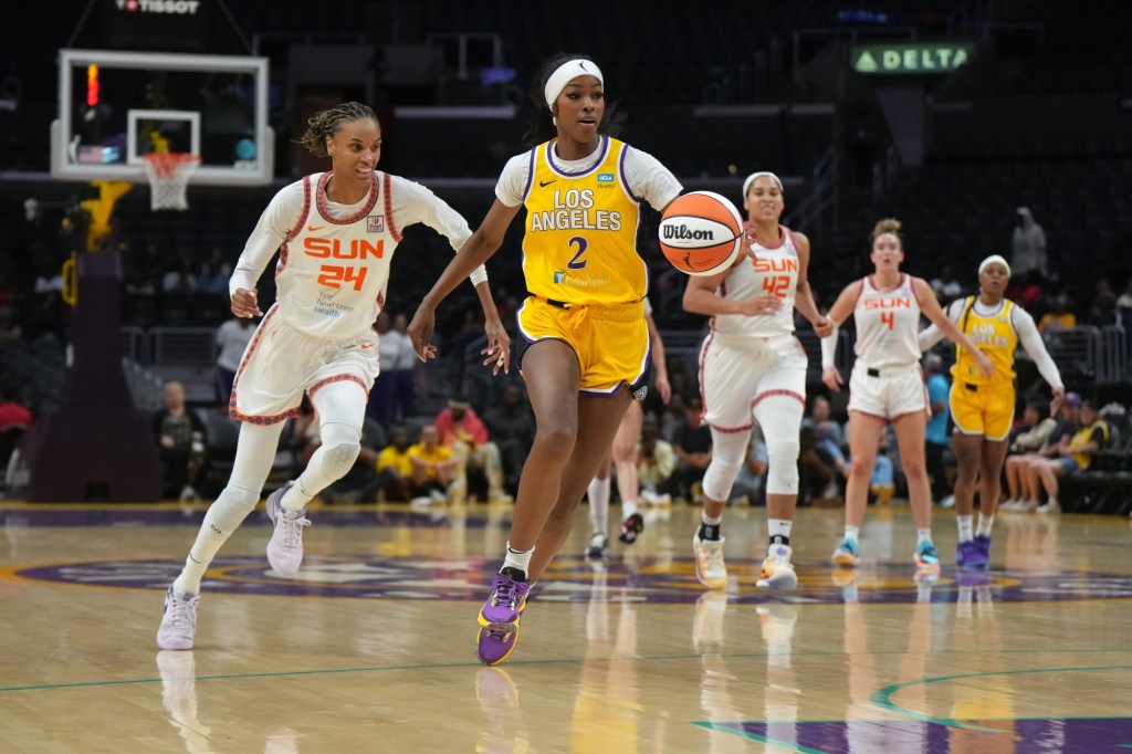 Sep 10, 2024; Los Angeles, California, USA; LA Sparks forward Rickea Jackson (2) dribbles the ball against Connecticut Sun forward DeWanna Bonner (24)  in the first half at Crypto.com Arena.