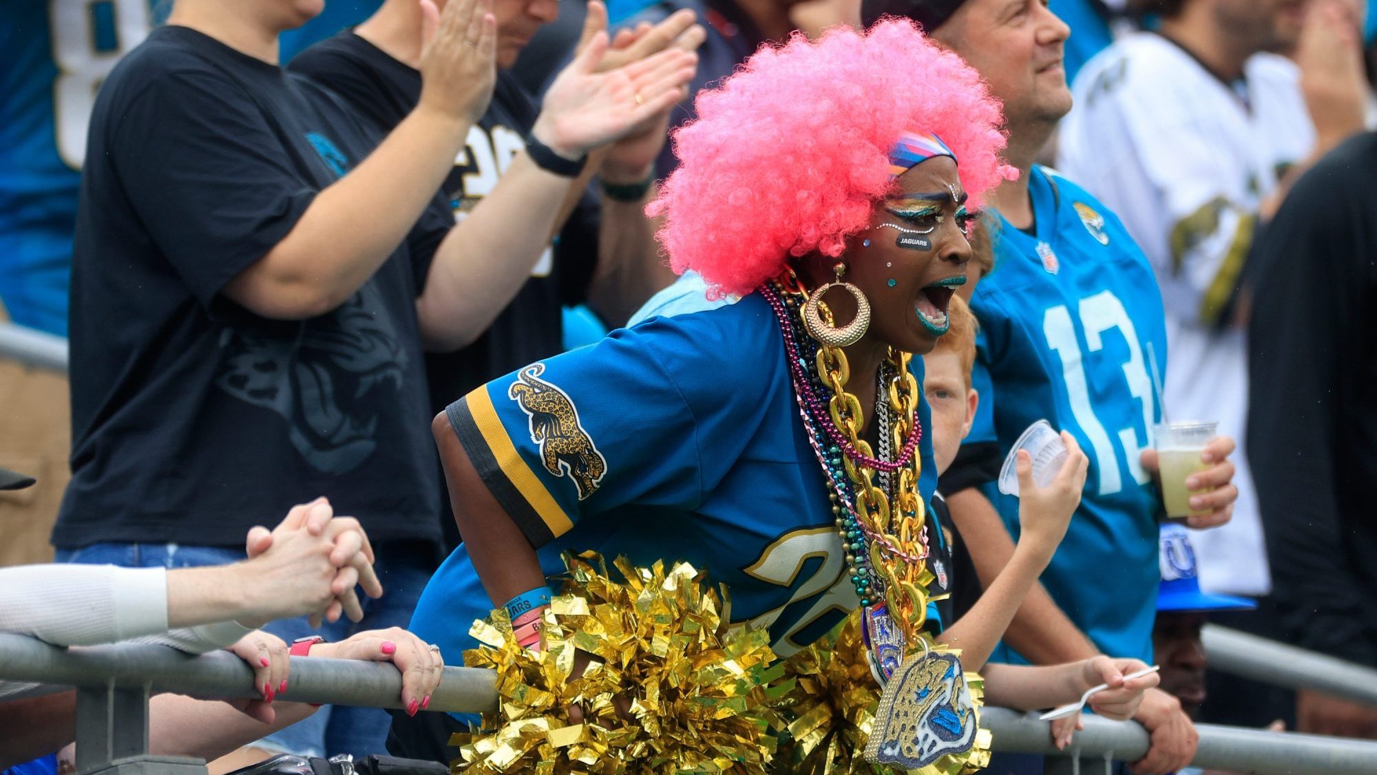 Jacksonville Jaguars fan Dee Dee Ellis yells with her pink wig during the third quarter of an NFL football matchup Sunday, Oct. 6, 2024 at EverBank Stadium in Jacksonville, Fla. The Jaguars edged the Colts on a field goal 37-34.