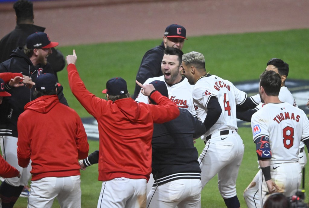 Oct 17, 2024; Cleveland, Ohio, USA; Cleveland Guardians first baseman David Fry (6) celebrates with teammates after hitting a game-winning home run during the tenth inning against the New York Yankees in game 3 of the American League Championship Series at Progressive Field.