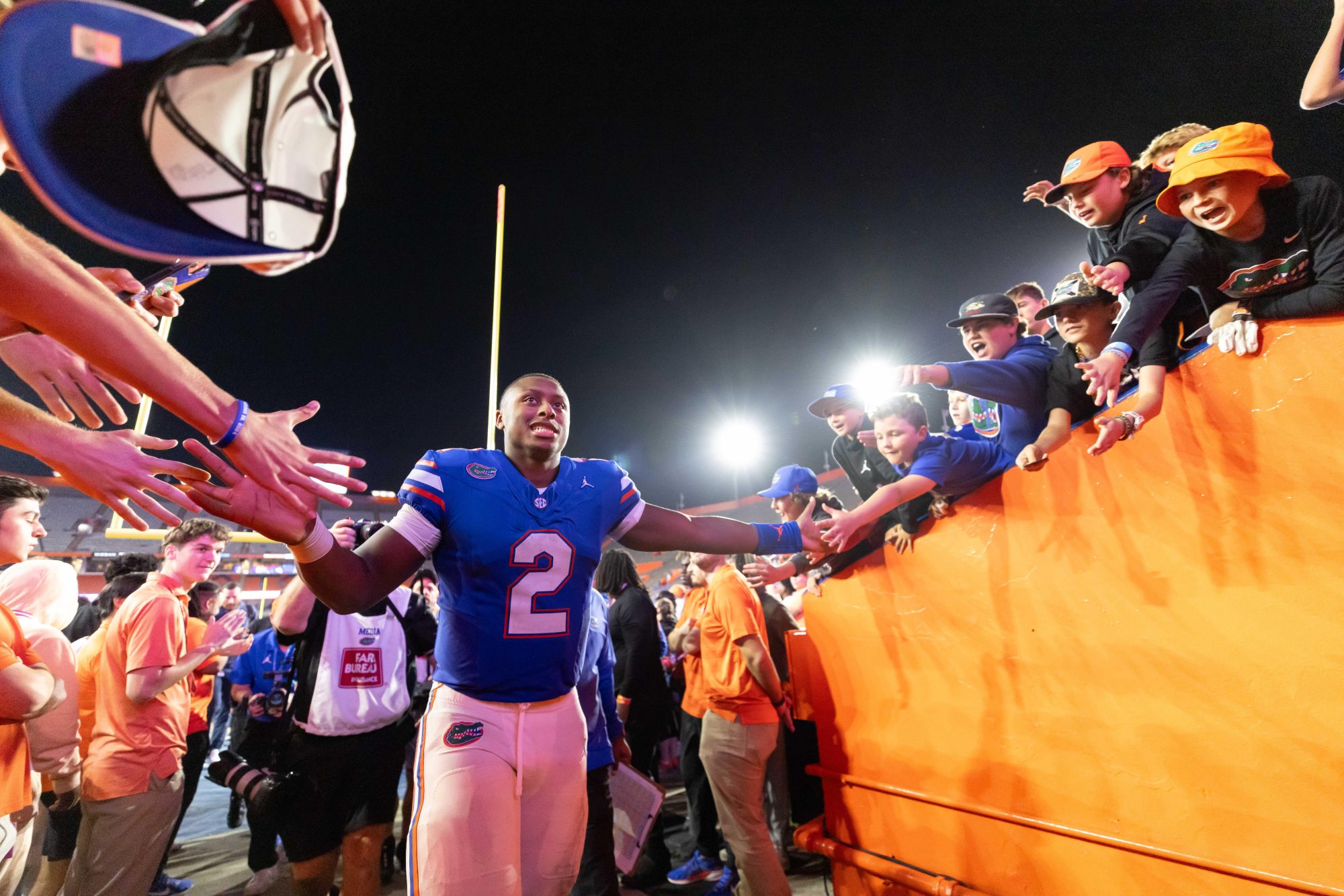 Oct 19, 2024; Gainesville, Florida, USA; Florida Gators quarterback DJ Lagway (2) shakes hands while entering the locker room after a game against the Kentucky Wildcats at Ben Hill Griffin Stadium.