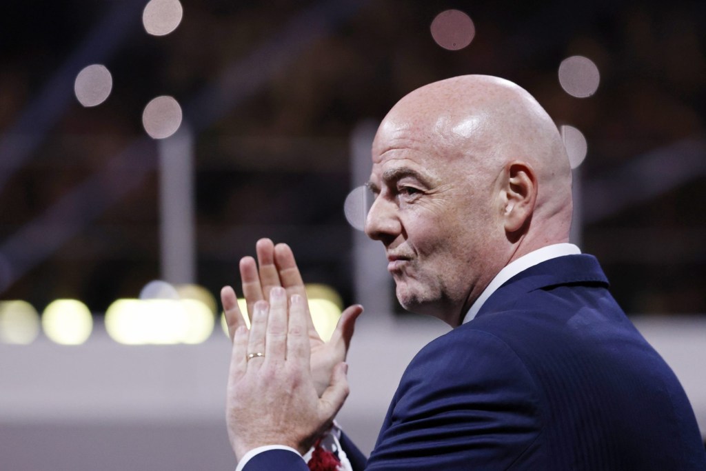 Dec 18, 2022; Lusail, Qatar; FIFA president Gianni Infantino claps during the awards ceremony after the 2022 World Cup final between Argentina and France at Lusail Stadium.