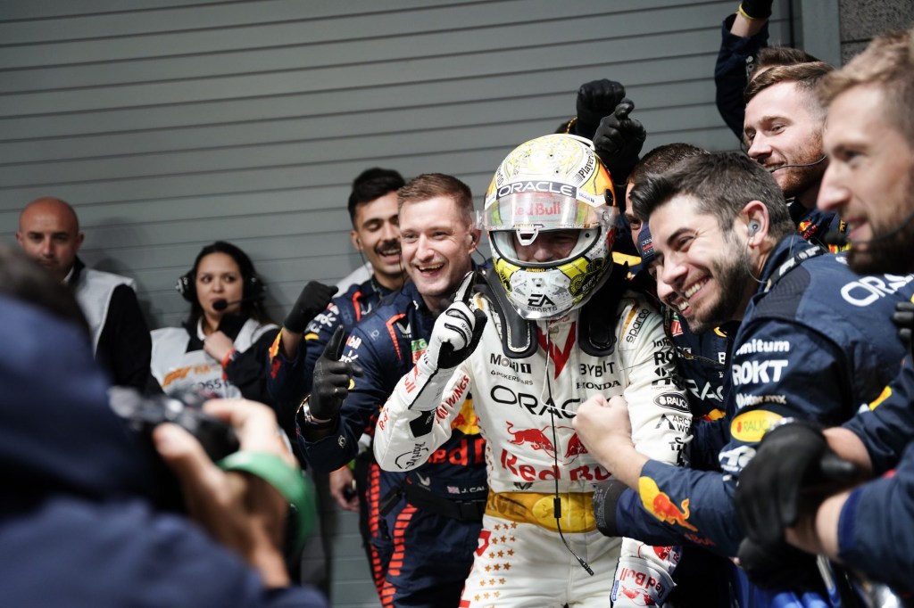 Nov 18, 2023; Las Vegas, Nevada, USA; Red Bull Racing Honda driver Max Verstappen of Netherlands (1) celebrates with his team after winning the Formula 1 Heineken Silver Las Vegas Grand Prix at the Las Vegas Strip Circuit.