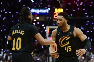 May 5, 2024; Cleveland, Ohio, USA; Cleveland Cavaliers guard Donovan Mitchell (45) celebrates with guard Darius Garland (10) after Garland hit a three point basket during the second half against the Orlando Magic in game seven of the first round for the 2024 NBA playoffs at Rocket Mortgage FieldHouse.