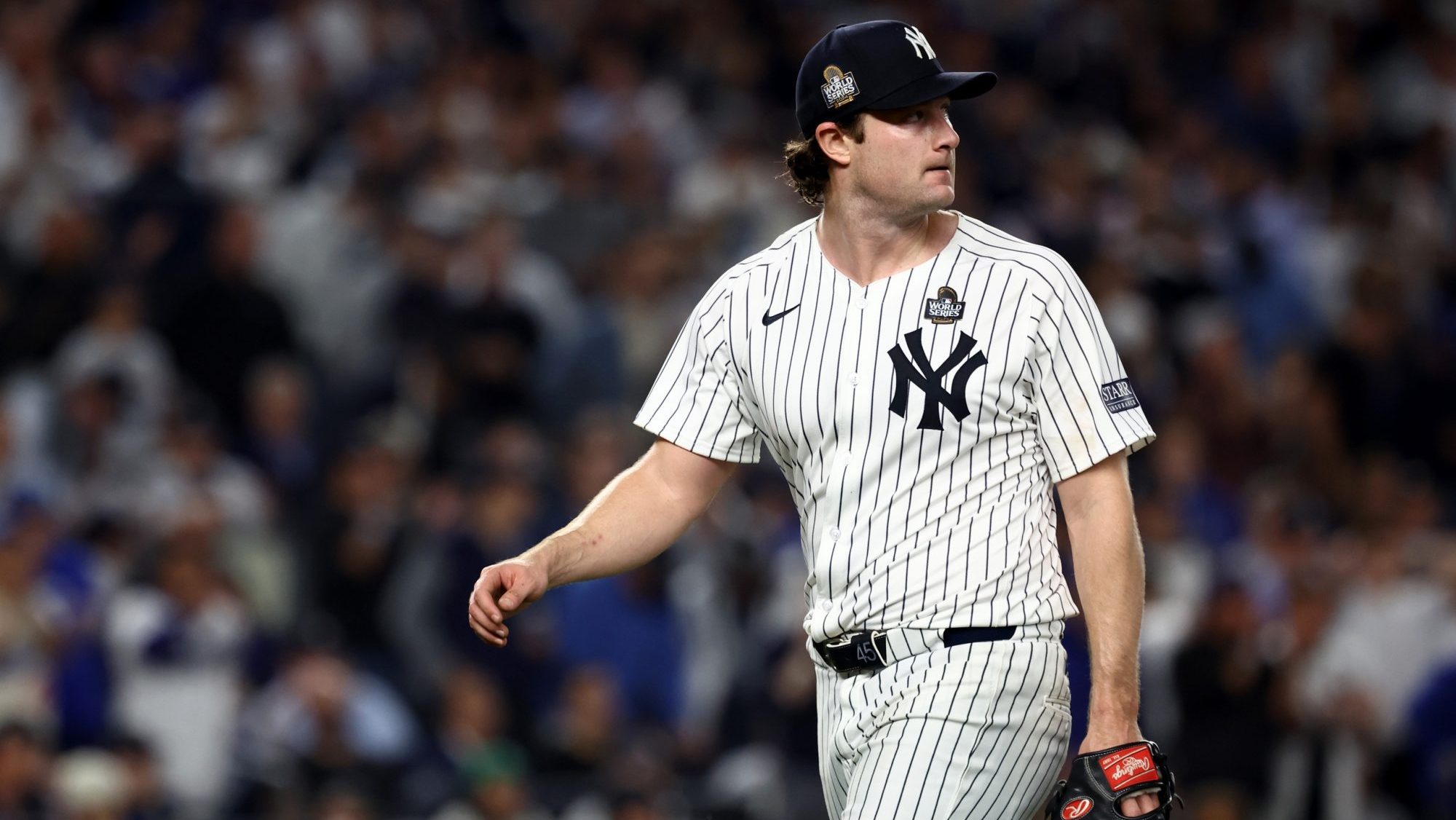 Oct 30, 2024; New York, New York, USA; New York Yankees pitcher Gerrit Cole (45) reacts after a play during the fifth inning against the Los Angeles Dodgers in game five of the 2024 MLB World Series at Yankee Stadium.