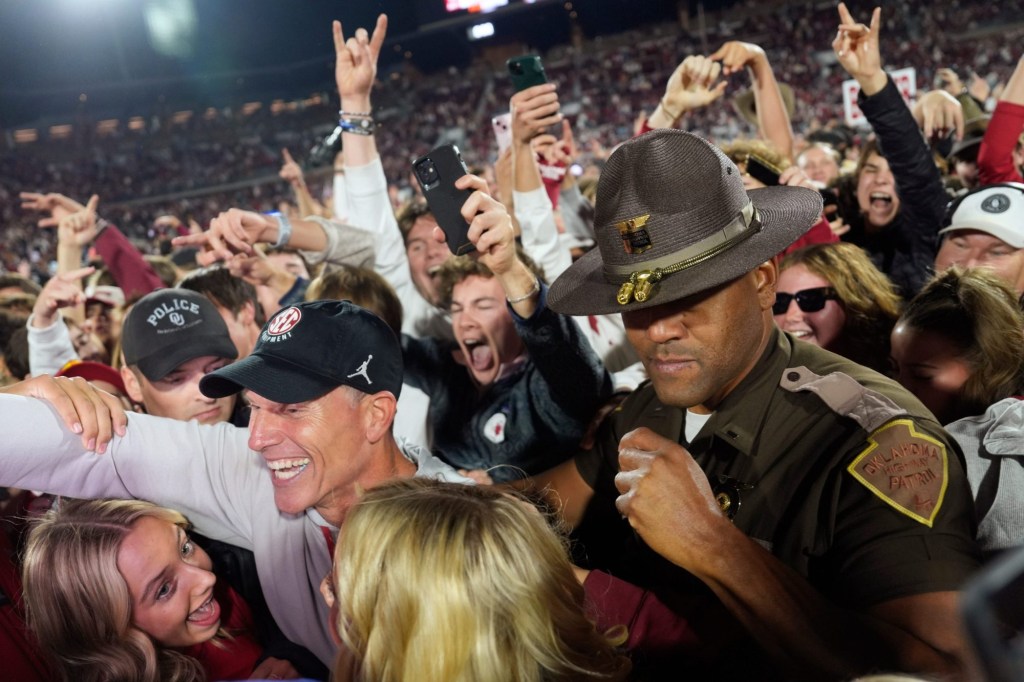 Oklahoma coach Brent Venables celebrates with fans after a college football game between the University of Oklahoma Sooners (OU) and the Alabama Crimson Tide at Gaylord Family - Oklahoma Memorial Stadium in Norman, Okla., Saturday, Nov. 23, 2024. Oklahoma won 24-3.