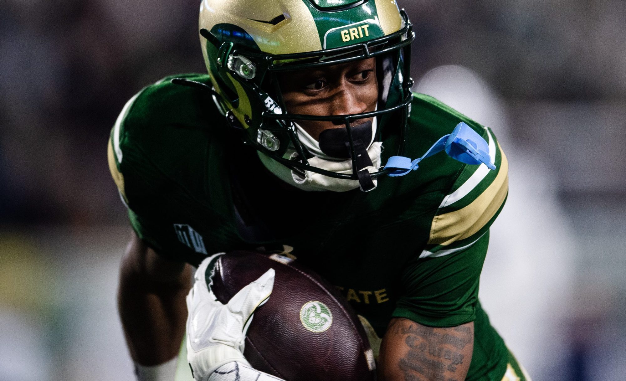 Colorado State's Jordan Ross looks back as he runs in to the endzone during a home game against Utah State on Friday, Nov. 29, 2024 in Fort Collns, Colo.