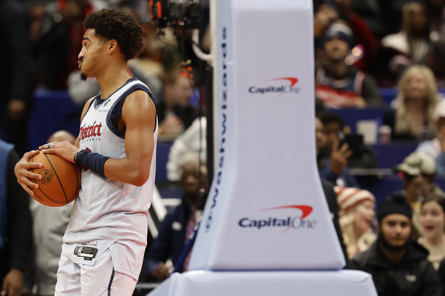 Dec 7, 2024; Washington, District of Columbia, USA; Washington Wizards guard Jordan Poole (13) reacts after the final horn against the Denver Nuggets at Capital One Arena.