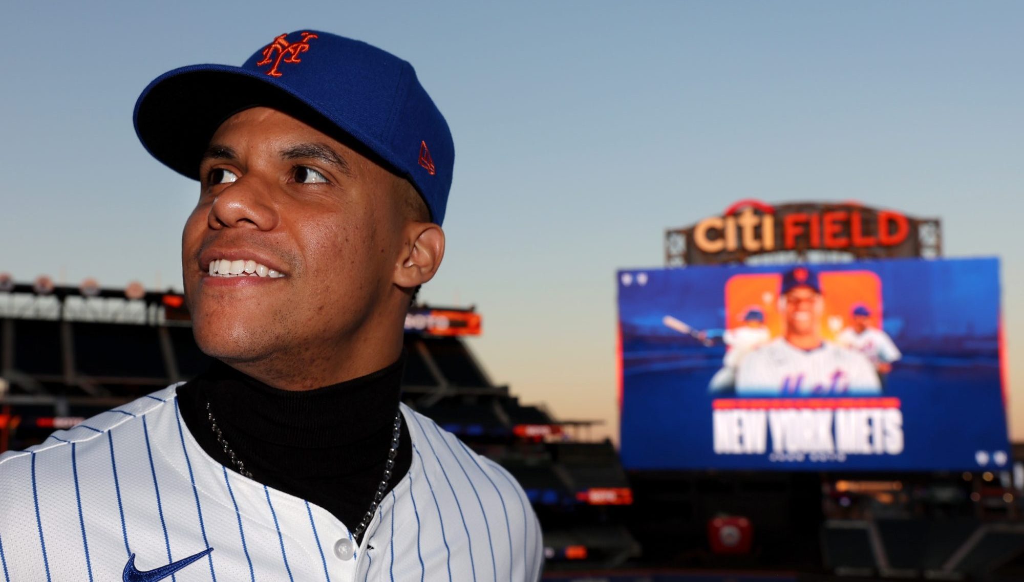 Dec 12, 2024; Flushing, NY, USA; New York Mets right fielder Juan Soto poses for photos during his introductory press conference at Citi Field.